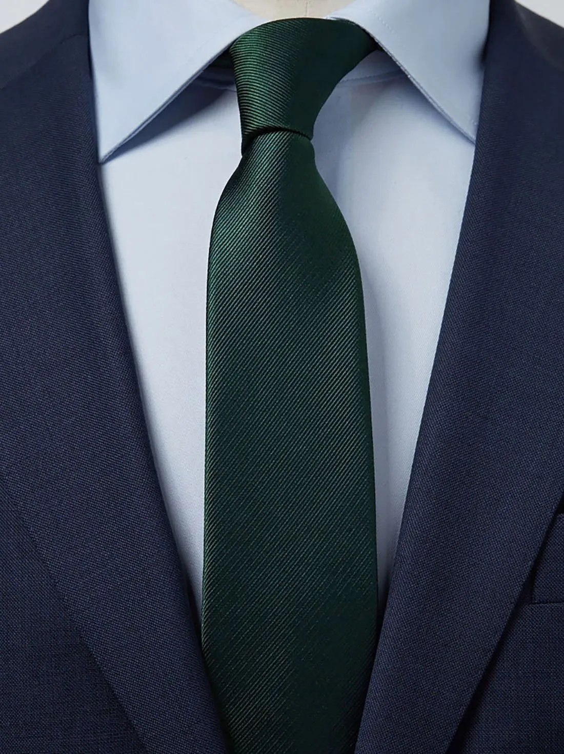 blue suit green tie