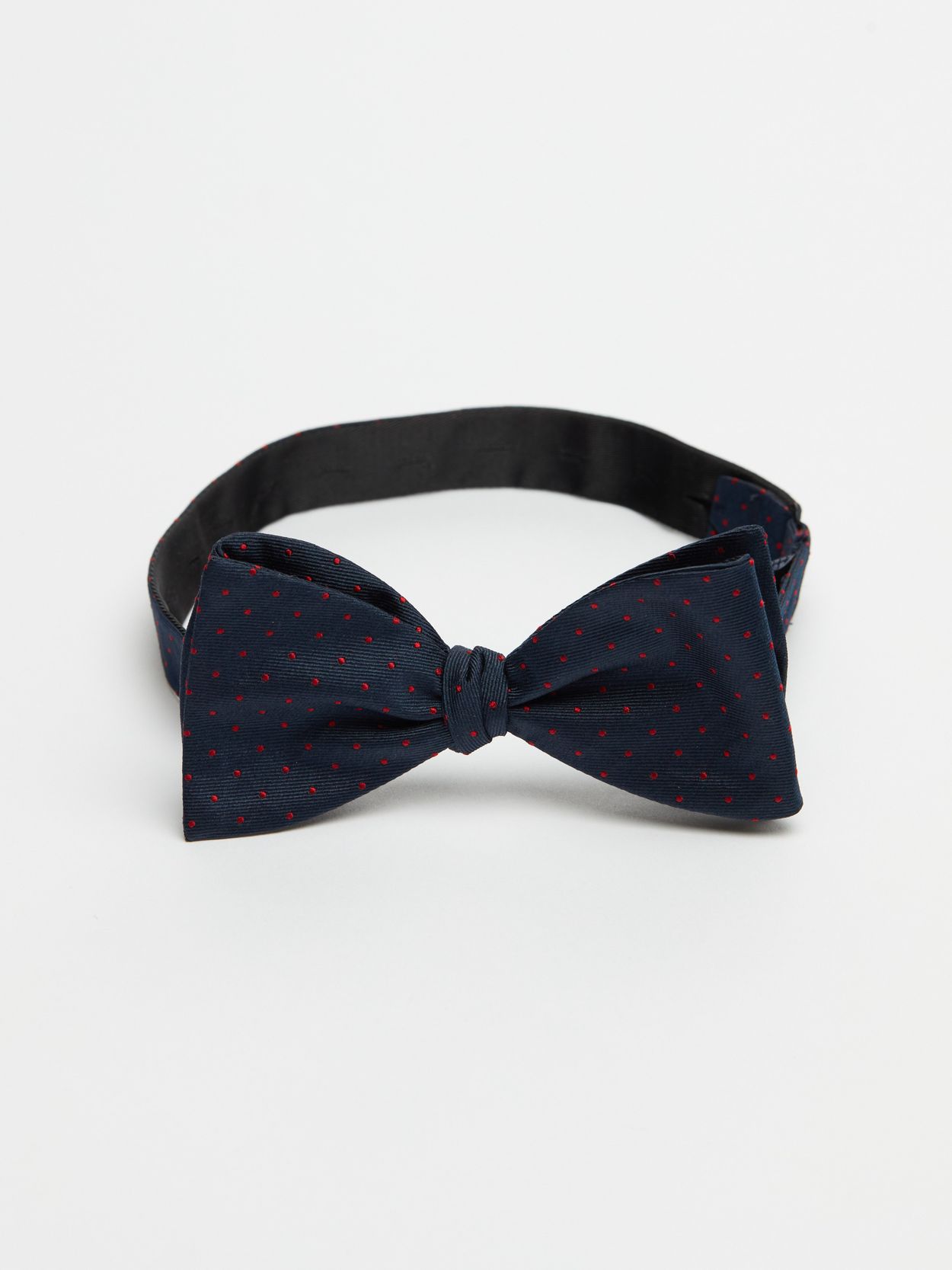 Bow Tie Dot - Koop online | John Henric, image size:1250x1667