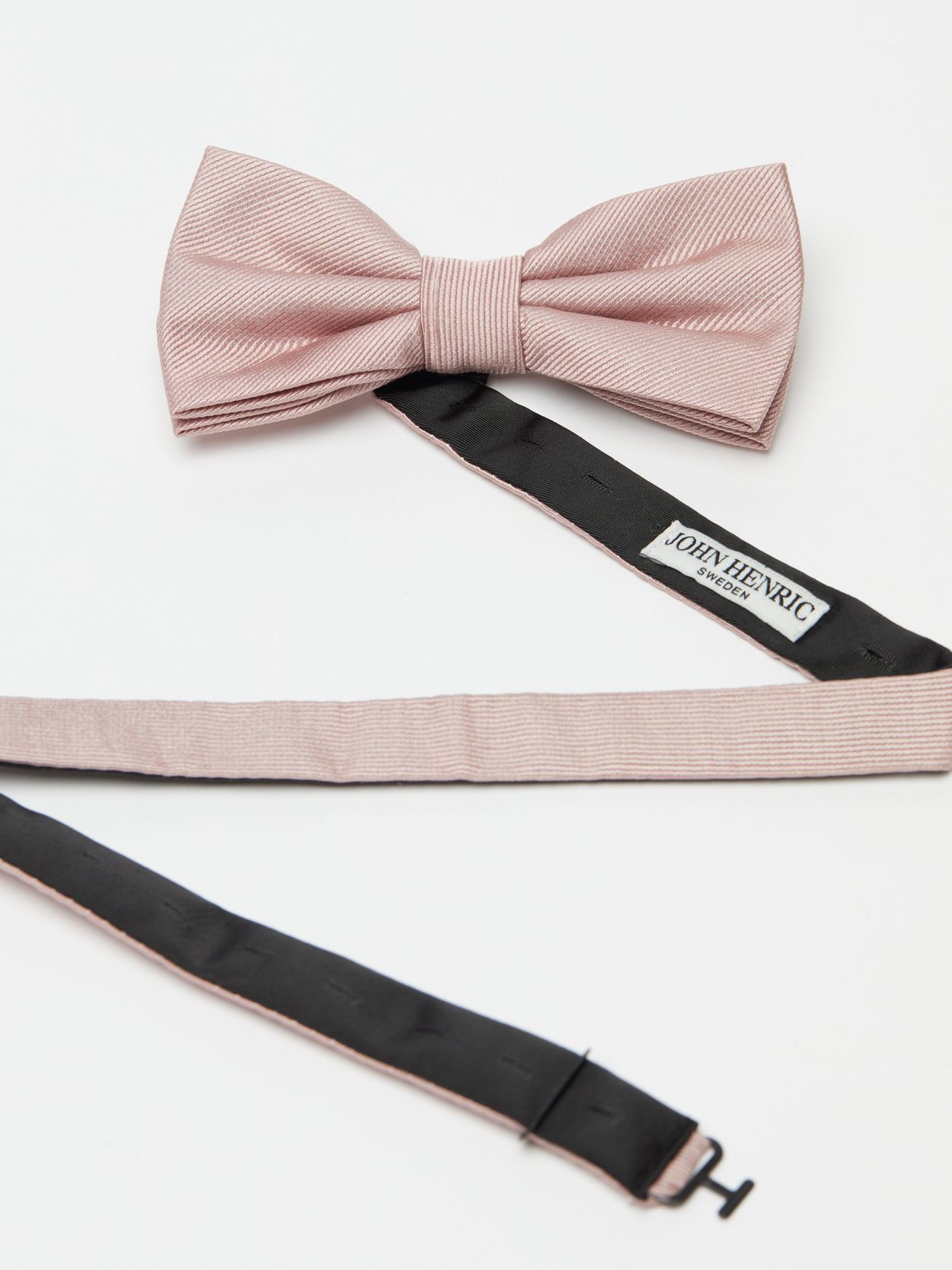 dusty pink bow tie and suspenders